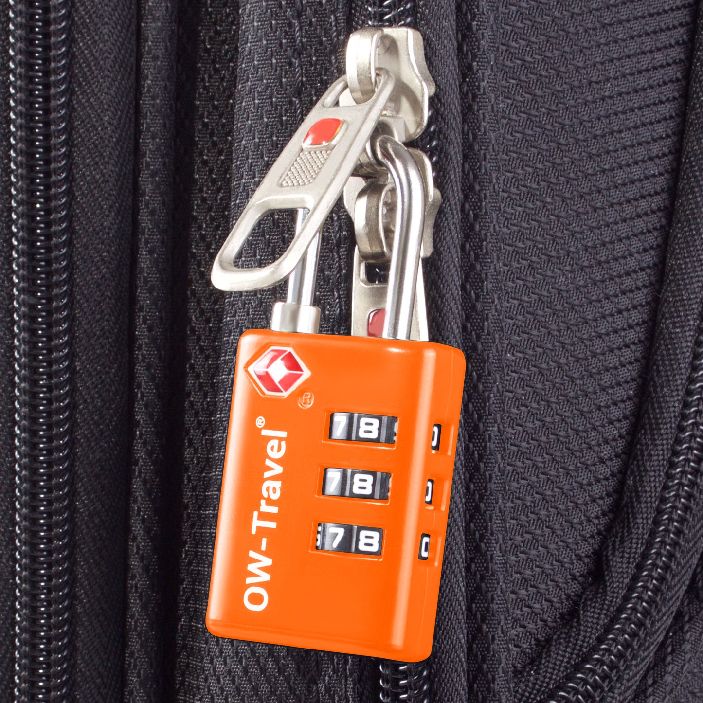 TSA luggage locks. Orange suitcase bag padlocks with inspection alert